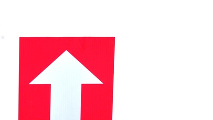 White red arrow sign on white board with copy space 