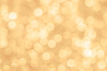 Abstract light golden color background with expressive bokeh_