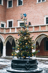 Fototapeta na wymiar christmas tree decorations outside natural needles colored