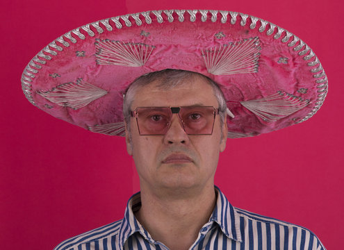 Closeup Portrait Of A Man In Sombrero