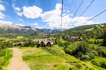 Telluride small town in Colorado with high wide angle above view of city cityscape from free...