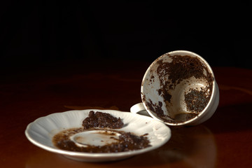fortune telling on coffee grounds. mug and saucer