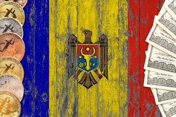 Moldova savings concept. Bitcoins and dollar banknotes on the side of national flag with wooden background. Trading currencies.