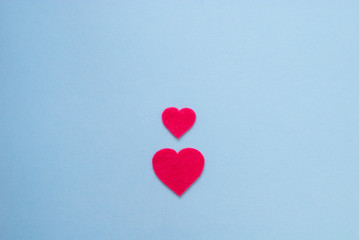 Fototapeta na wymiar pink hearts on blue background, flatlay, St Valentine's composition