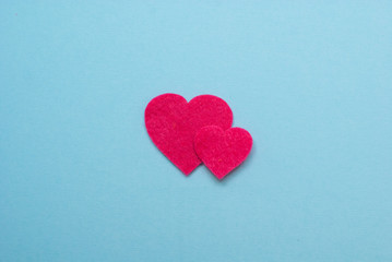 pink hearts on blue background, flatlay, St Valentine's composition