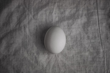 egg on dark cloth flat lay