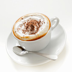 Cup of cappuccino with cream and chocolate