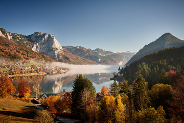 Beautiful view over Grundlsee lake..An hour before this shot was taken, the valley was filled with fog. Soon after the sunrays hit the valley the fog dissipated and offered this beautiful view.