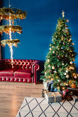 festive Christmas decorations on a blue background, Christmas tree. New Year and Christmas concept