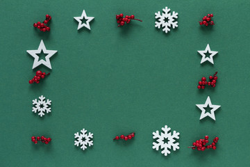Christmas composition. White snowflakes and stars top view background with copy space for your...