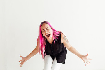 the girl with the pink hair is screaming hysterics