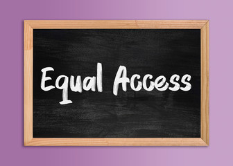 Obraz premium Vintage chalkboard in wooden frame on violet background. Chalkboard isolated with 