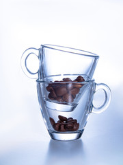 Close-up of two glasses of espresso from coffee beans. place for your text