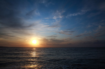 Landscape over the sea water surface on colorful sky at sunset background