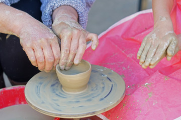 Teaching of ceramics processing to a young student in Bulgaria