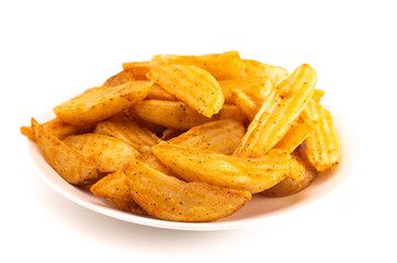 Pile of Spiced Potato Wedges Isolated on a White Background