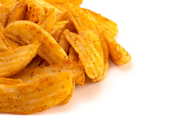 Pile of Spiced Potato Wedges Isolated on a White Background