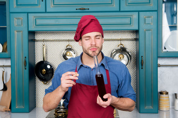 man chef smell wive vinegar. Red Wine Vinegar benefits. perfect quality. strong aroma. intensity of...