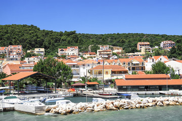 Fototapeta na wymiar Kefalonia island coast with houses