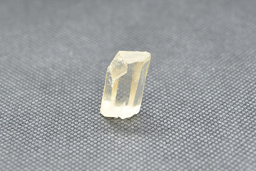 Natural quartz crystal on a black background.