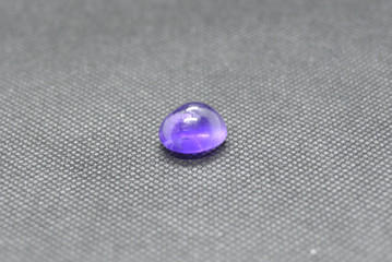 Natural amethyst in a form of cobochon shape.