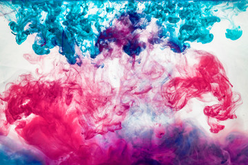 the water color ink movement explosion, abstract color background paint in water, liquid art