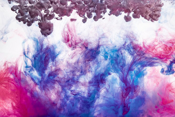 the water color ink movement explosion, abstract color background paint in water, liquid art