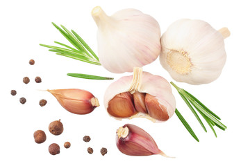 garlic with rosemary, peppercorns and allspice isolated on white background. top view
