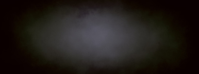 Black background in old vintage chalkboard texture design, soft blurred spotlight center with dark charcoal gray colors 