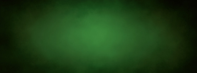 green Christmas background banner with black border and grunge metal texture design and soft center lighting