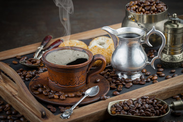 Black coffee on an old background in a cup
