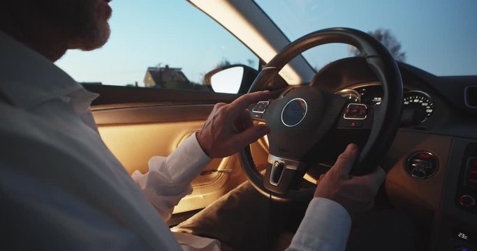 Male Person Driving Futuristic Car Activates Autopilot On Augmented Reality Hologram Hud. Shot For Animation. Vehicle Starts Autonomous Self-driving. Hands Free System. Driverless Future Technology.