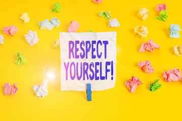 Writing note showing Respect Yourself. Business concept for believing that you good and worthy being treated well Colored crumpled paper empty reminder white floor clothespin