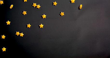 Star shaped small sugar candies - flat lay