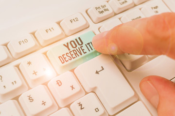Text sign showing You Deserve It. Business photo showcasing should have it because of their...