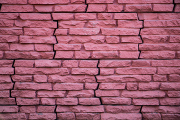 Pink stone wall, house facade