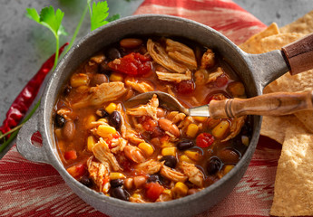 Homemade Taco Chicken Soup in a rustic pot