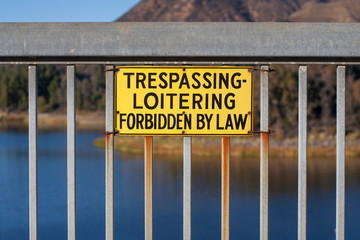 No Trespassing or Loitering sign