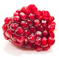 Piece of pomegranate isolated on a white background.