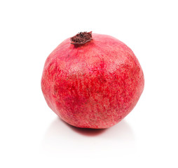 Ripe pomegranate isolated on a white backgound.