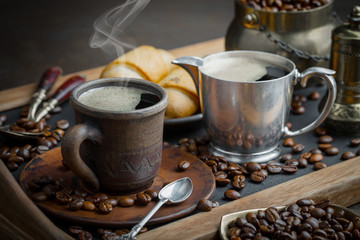 Black coffee on an old background in a cup