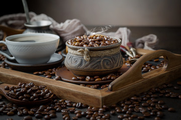 Black coffee on an old background in a cup