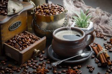 Black coffee on an old background in a cup