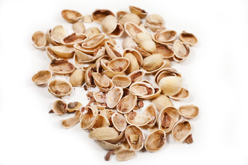Pistachio shells isolated on a white background.
