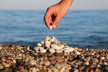 Pyramid of stones on the beach.