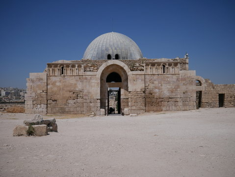Exterior of the ruin of an impressive building resembling a mosque within the Roman ruins of the citadel of Amman, capitol of Jordan