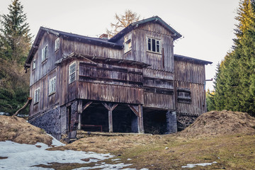 Desolate wooden mountain hostel in Owl Mountains Landscape Park on the slope of Wielka Sowa...