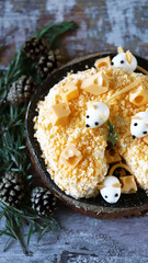 New Year's keto salad with cheese and eggs. Mouse cheese salad. Keto menu for Christmas and 2020 New Year. Selective focus. Macro.