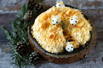 New Year's keto salad with cheese and eggs. Mouse cheese salad. Keto menu for Christmas and 2020 New Year. Selective focus. Macro.