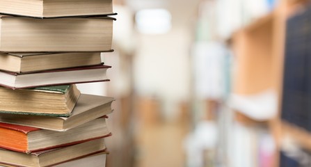 Old Books stacked on background.